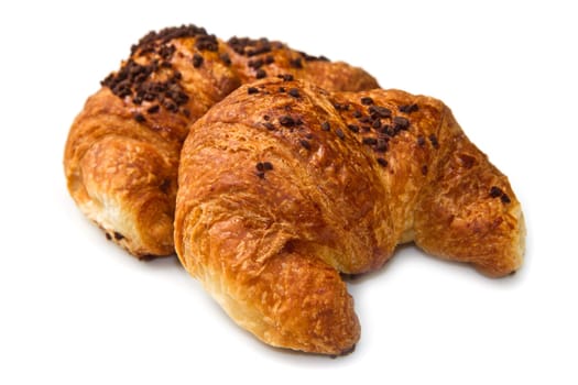 Fresh and tasty croissant on the white