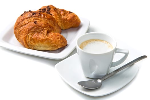 Cup of coffee with croissants isolated in white