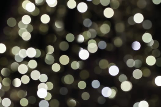 Defocused abstract christmas background, out of focus light spots forming a soft background