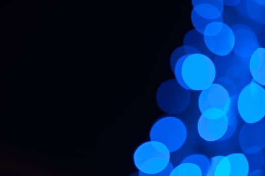 Defocused abstract christmas background, out of focus light spots forming a soft background