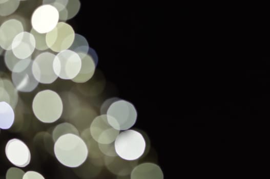 Defocused abstract christmas background, out of focus light spots forming a soft background