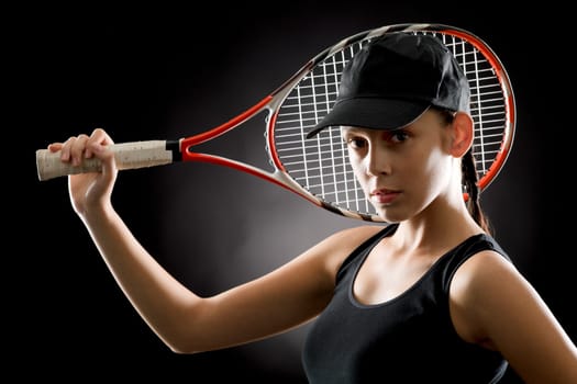 Black tennis- portrait of female player with racket