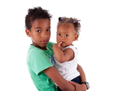 Portrait of a African American brother and sister, isolated on white background
