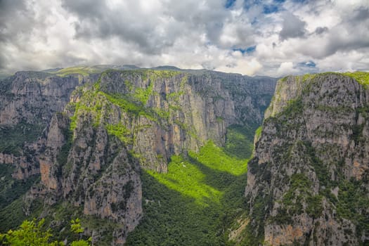 Overcast landscape in summer of the Vikos Gorge in Greece.