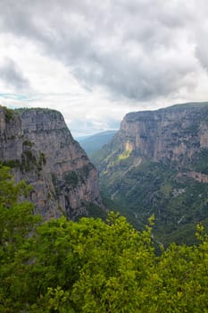 Overcast landscape in summer of the Vikos Gorge in Greece.