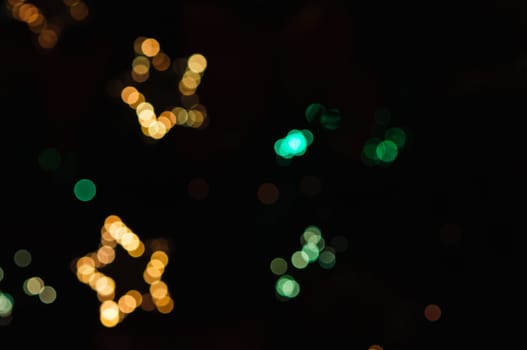 Defocused abstract christmas background, out of focus light spots forming a soft background