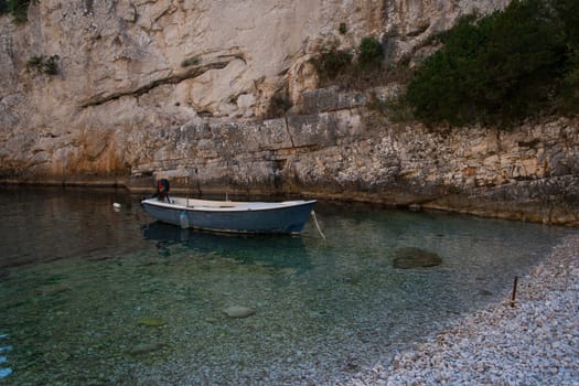 White boat on the beach in Stiniva bay