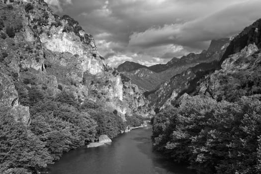 Black and white landscape of Aoos River and Pindus Mountains, Greece.