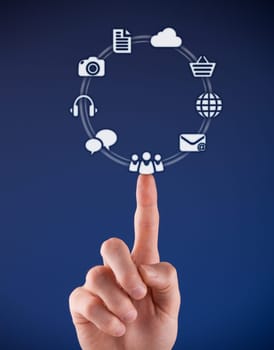 Social media concept - man click on virtual icon representing social media. Vertical composition, blue background.