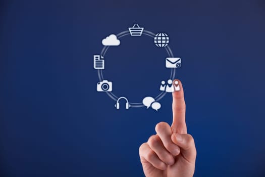 Social network concept - man click on virtual icon representing social media. Horizontal composition, blue background.