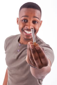 Young african american man offering a cigarette, isolated on white background