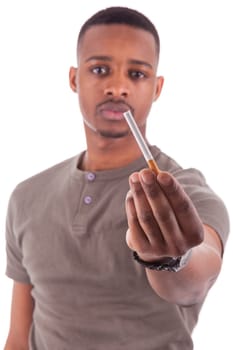 Young african american man offering a cigarette, isolated on white background