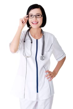 Nurse or young doctor standing smiling. Isolated on white background. Full body