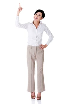Beautiful business woman showing on copy space above her