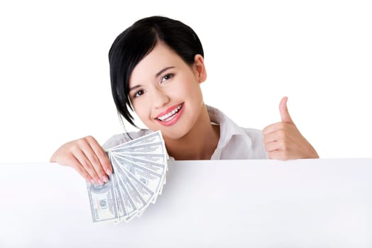 Business woman with blank sign board holding money.
