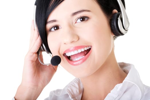 Beautiful young call-center assistant smiling at the camera