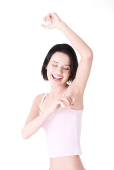 Beautiful young woman using antiperspirant