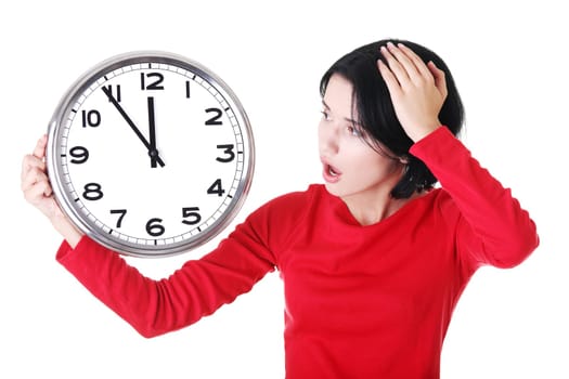 Shocked woman holding office clock, isolated on white bacvkground