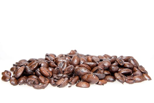 Pile of Roasted Coffee Beans Isolated on White Background