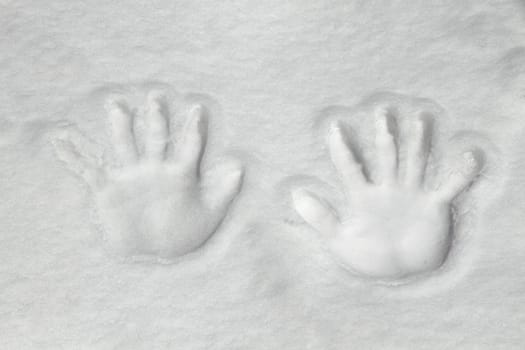 Two hand print in snow