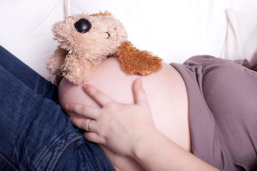 Cuddly toy and baby bump