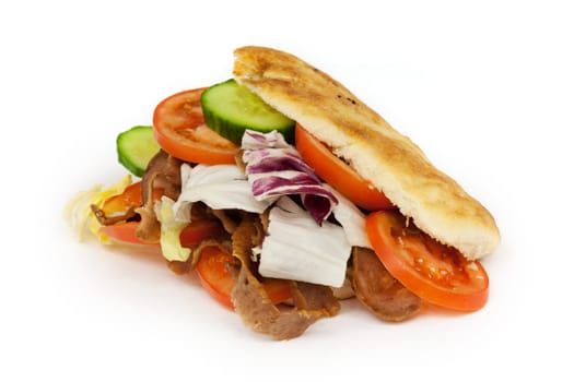 Kebab,fast food with lamb in front of a white background