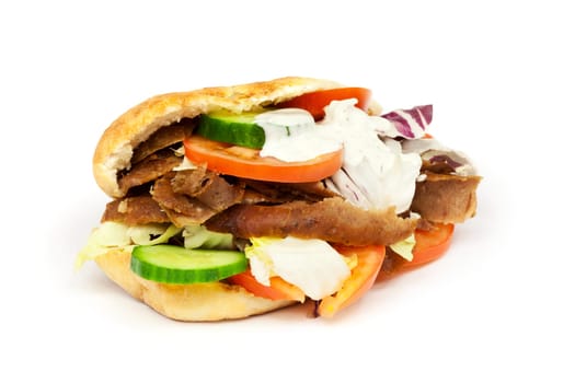 Kebab,fast food with lamb in front of a white background
