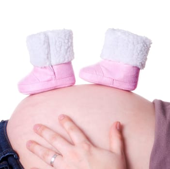 Baby shoes on baby bump
