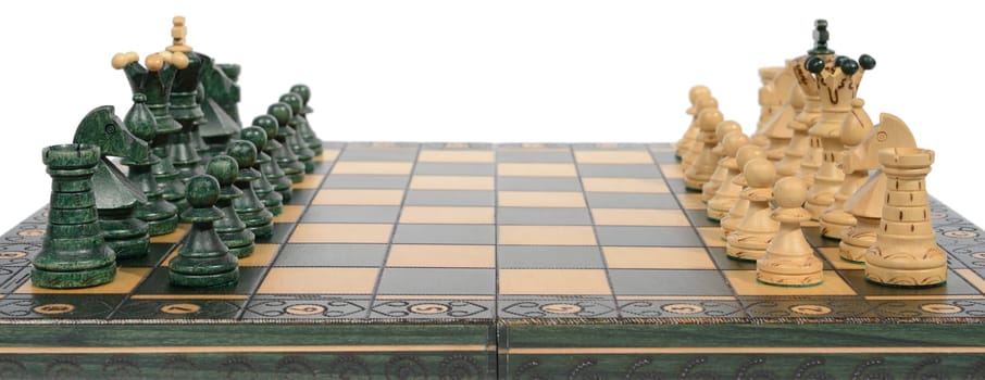 Wooden chess board and pieces (complete), isolated on white.