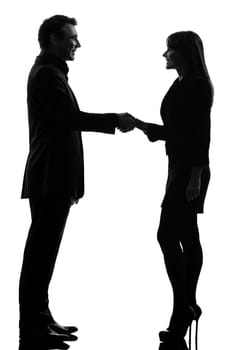 one caucasian couple business woman man in silhouette studio isolated on white background