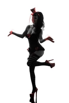 one caucasian woman stripper showgirl portrait  in silhouette studio isolated on white background