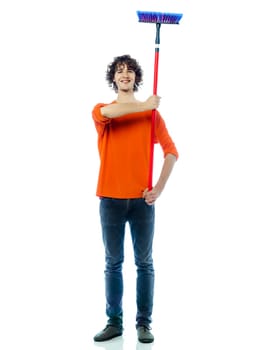 one young man caucasian holding saluting broom portrait  in studio white background