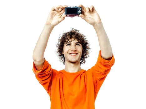 one young man caucasian holding saluting broom portrait  in studio white background