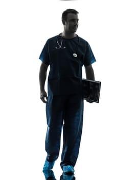 one caucasian man doctor surgeon medical worker  thinking pensive silhouette isolated on white background