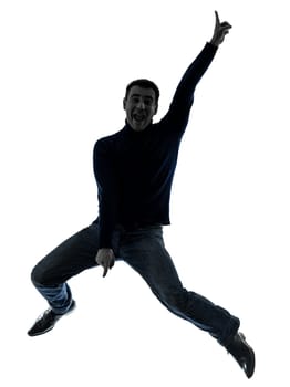 one causasian man full length in silhouette studio isolated on white background