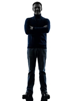 one causasian man full length in silhouette studio isolated on white background