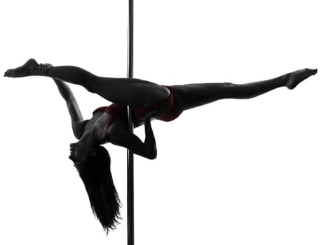 one caucasian woman pole dancer dancing in silhouette studio isolated on white background