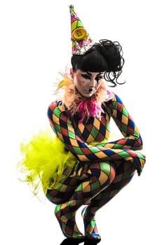 one caucasian woman harlequin circus dancer performer  in silhouette studio isolated on white background