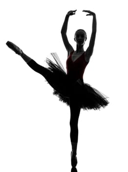 one caucasian young woman ballerina ballet dancer stretching warming up in silhouette studio on white background