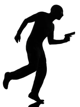thief criminal terrorist in silhouette studio isolated on white background