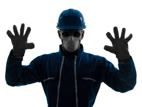 one caucasian man construction worker pointing showing silhouette portrait in studio on white background