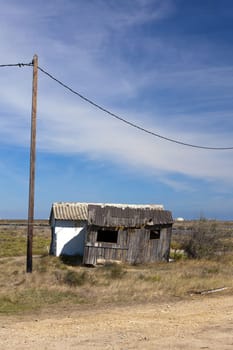 Old dilapidated workers' huts at the salt works in Gruissan in southern France
