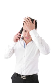 Young handsome businessman talking at the cell phone