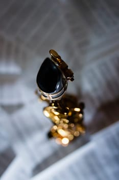 A soprano saxophone lies on notes