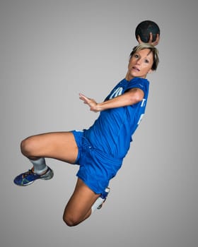 Handball player in jump throw