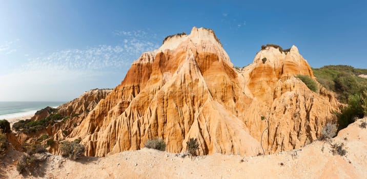 Stitched panorama of the sandstone cliffs in Gale beach, Comporta , Portugal