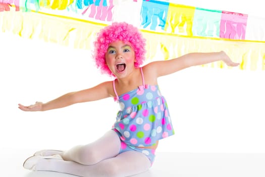 child kid girl with party clown pink wig funny happy open arms expression and garlands