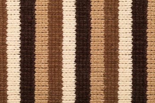Knitted fabric texture for background. Brown stripes, closeup