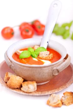 Tomato soup with fresh ingredients
