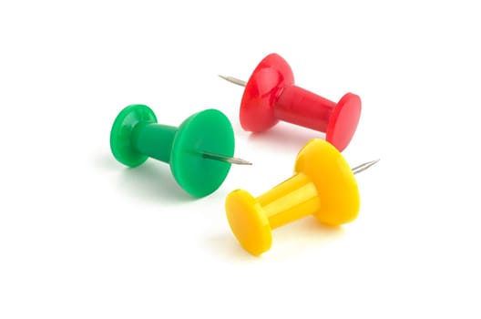 Three colorful pins